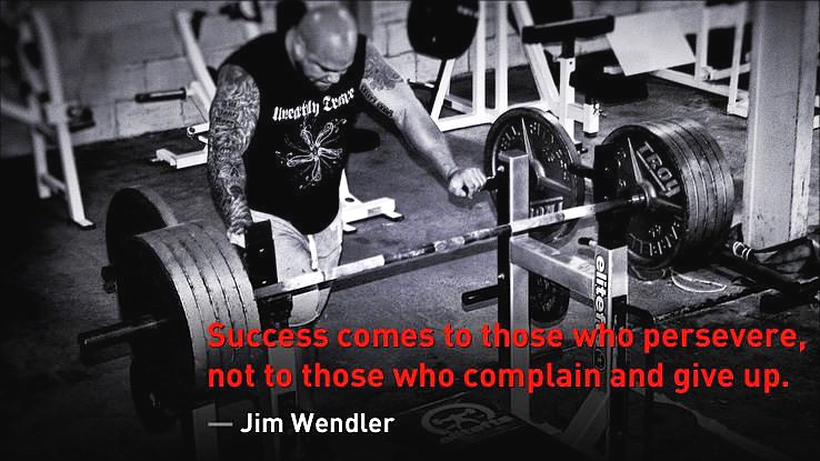 Jim Wendler beside a heavily loaded barbell — Boring But Big 3-Month Challenge