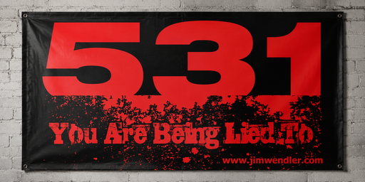 Red and black 5/3/1 You Are Being Lied To vinyl banner mounted on a light grey brick wall.