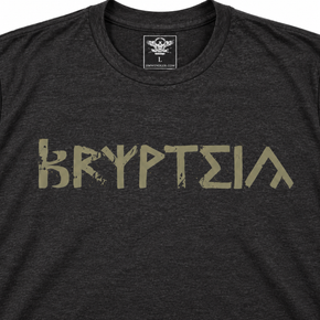Close-up of the Army Green Krypteia print and tag on a Heather Graphite shirt