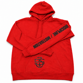 A bright red pullover hoodie with black text on the left sleeve reading 'DISCIPLINE / MOTIVATION' and a black graphic logo on the front pocket, shown on a plain white background.