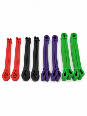 Complete Training Band Pack with four pairs of resistance bands in red, black, purple, and green.