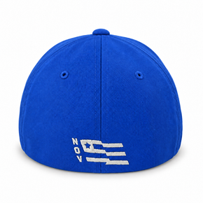 Rear view of royal blue Flexfit hat with white N.O.V. embroidery.