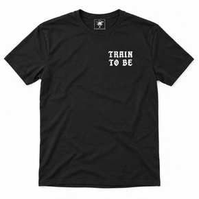 Front of the black Train To Be Dangerous shirt with a small white Train To Be chest print.